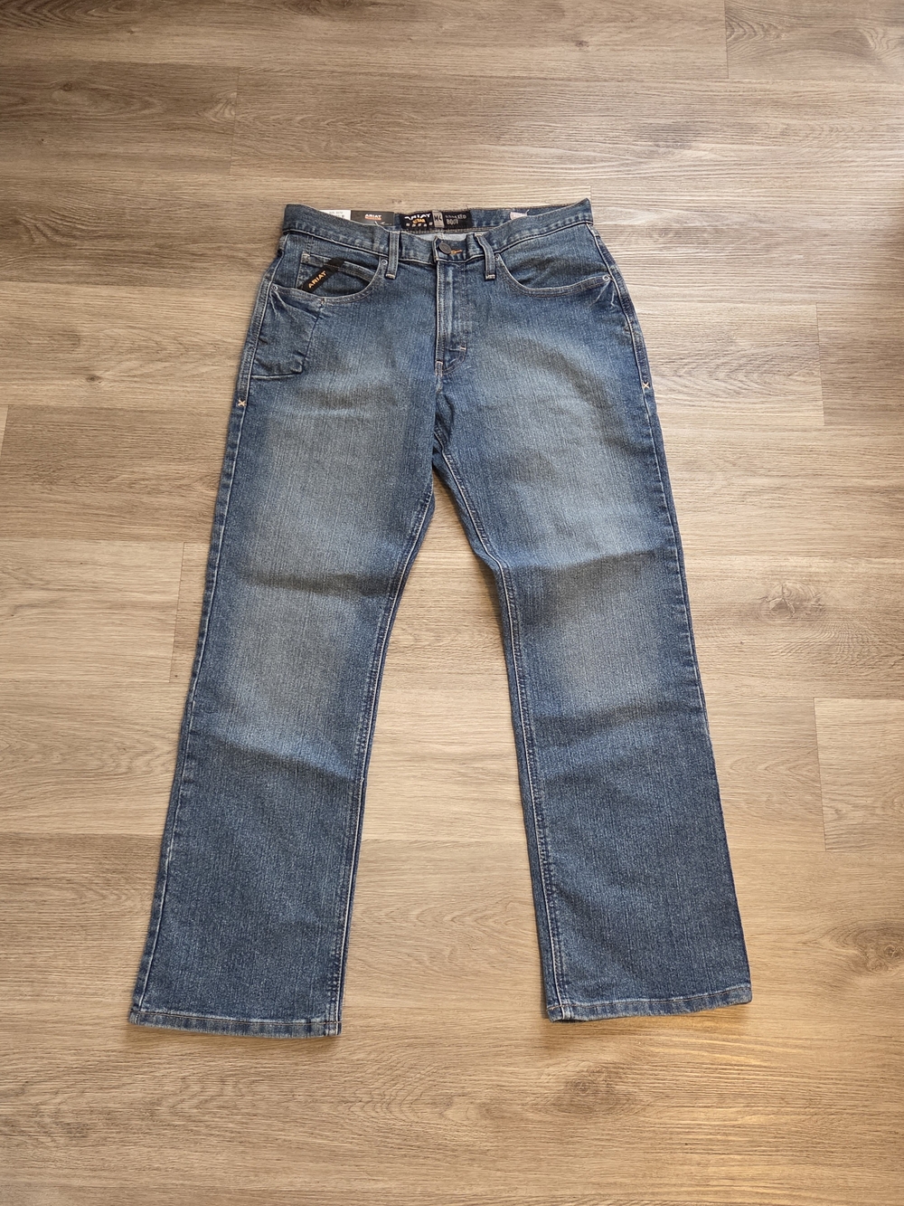 Ariat Men's Rebar M4 Relaxed DuraStretch Boot Cut Jeans.